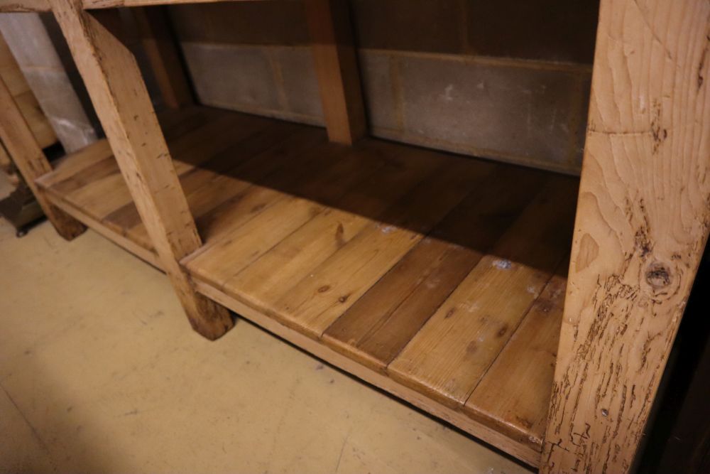 A Victorian beech and pine two tier kitchen table, width 183cm depth 65cm height 87cm